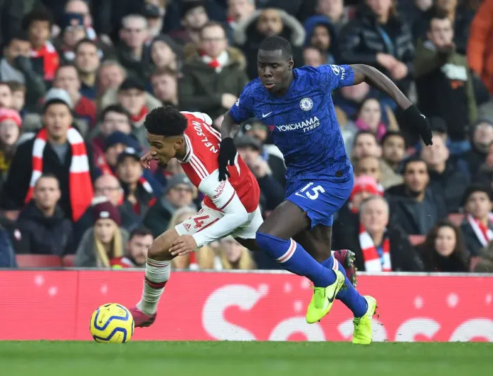 Framed Print : Arsenal vs. Chelsea: A Fierce Battle in the Premier League - Reiss Nelson vs. Kurt Zouma Framed Print : Arsenal vs. Chelsea: A Fierce Battle in the Premier League - Reiss Nelson vs. Kurt Zouma
