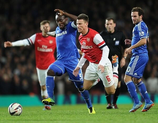 Arsenal vs. Chelsea: Koscielny Faces Off Against Essien and Mata in the Capital One Cup