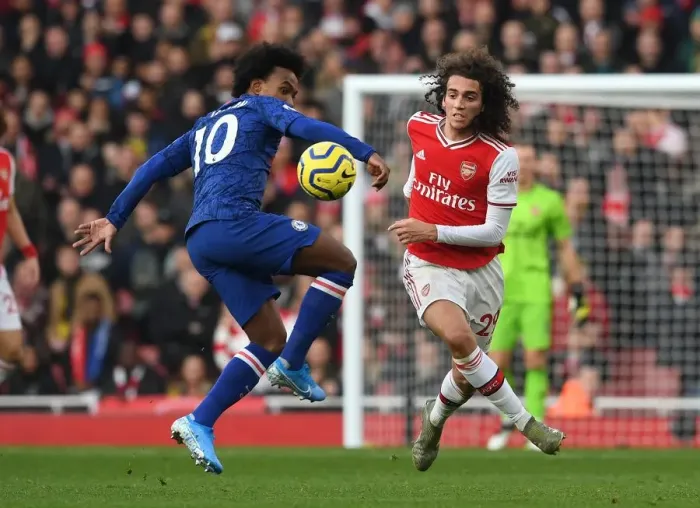 Framed Print : Arsenal vs. Chelsea: Matteo Guendouzi vs. Willian Clash in Premier League Showdown Framed Print : Arsenal vs. Chelsea: Matteo Guendouzi vs. Willian Clash in Premier League Showdown