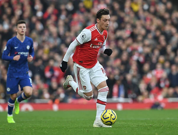 Arsenal vs. Chelsea: Mesut Ozil in Action during the 2019-20 Premier League Clash at Emirates Stadium