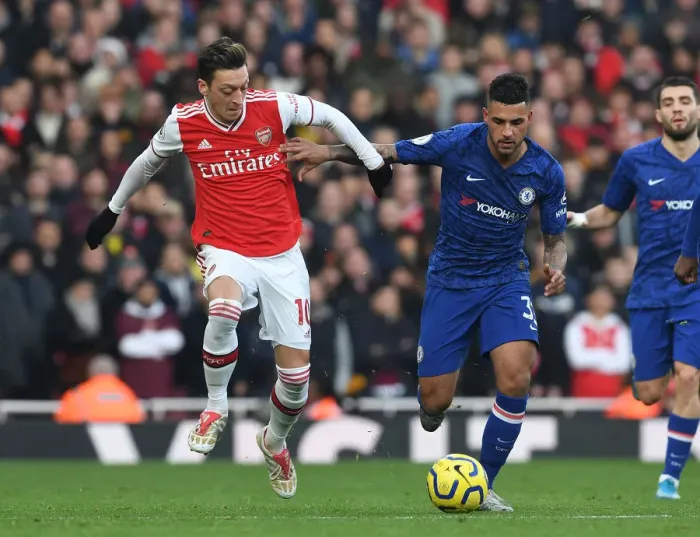 Framed Print : Arsenal vs. Chelsea: Mesut Ozil Clashes with Emerson in Premier League Showdown Framed Print : Arsenal vs. Chelsea: Mesut Ozil Clashes with Emerson in Premier League Showdown