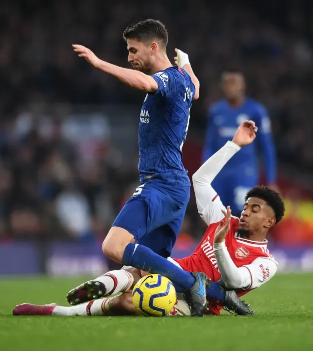 Framed Print : Arsenal vs. Chelsea: Nelson Tackles Jorginho in Intense Premier League Clash (2019-20)