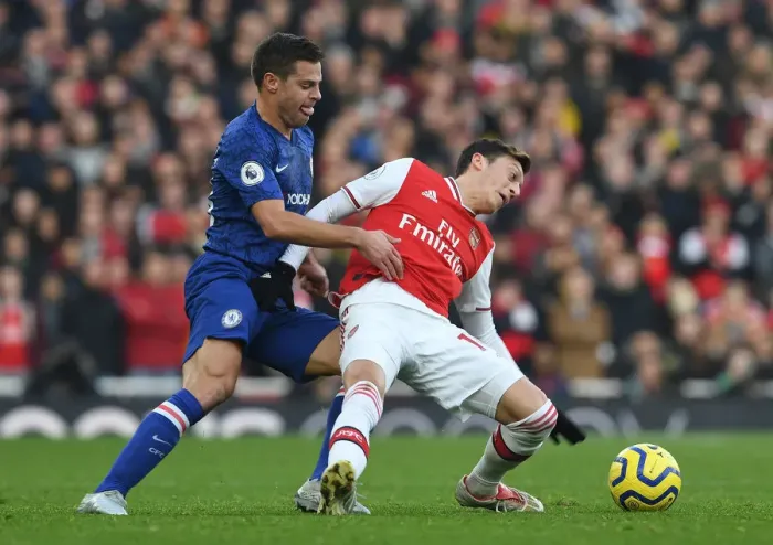 Framed Print : Arsenal vs. Chelsea: Ozil Fouls by Azpilicueta in Intense Premier League Clash (2019-20)