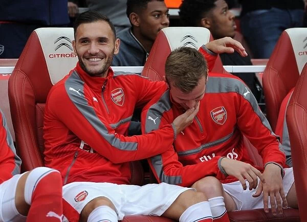 Arsenal vs. Chelsea: Pre-Match Moment at Emirates Stadium (2016-17) - Lucas Perez and Rob Holding in Focus