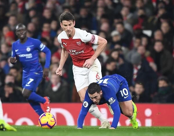 Arsenal vs. Chelsea Showdown: A Battle of Stars - Koscielny vs. Pedro