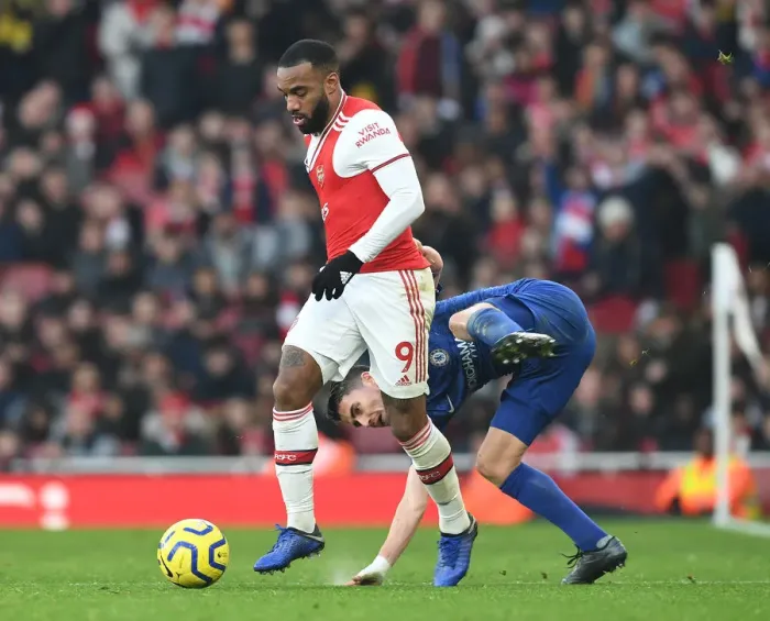 Framed Print : Arsenal vs. Chelsea Showdown: A Battle of Stars - Lacazette vs. Jorginho Framed Print : Arsenal vs. Chelsea Showdown: A Battle of Stars - Lacazette vs. Jorginho