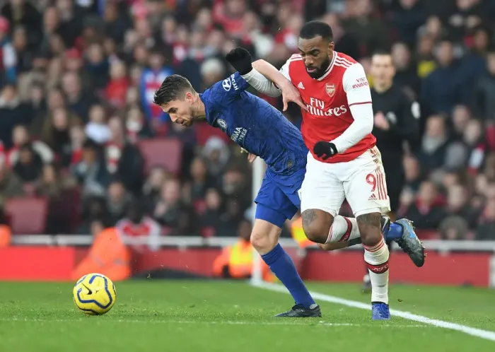 Framed Print : Arsenal vs. Chelsea Showdown: Lacazette vs. Jorginho - A Premier League Battle at Emirates Stadium (2019-20)