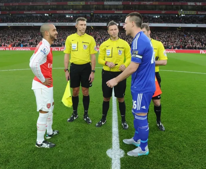 Framed Print : Arsenal vs. Chelsea: Walcott and Terry - A Premier League Rivalry Face-Off at Emirates Stadium Framed Print : Arsenal vs. Chelsea: Walcott and Terry - A Premier League Rivalry Face-Off at Emirates Stadium