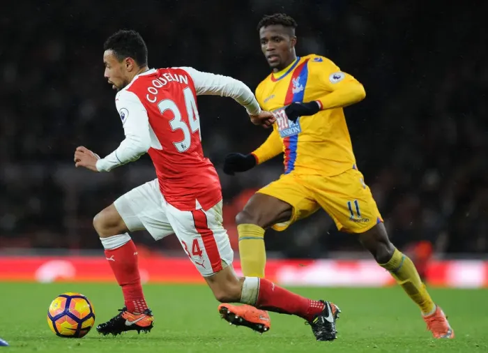 Framed Print : Arsenal vs Crystal Palace: Coquelin Clashes with Zaha in Premier League Showdown Framed Print : Arsenal vs Crystal Palace: Coquelin Clashes with Zaha in Premier League Showdown