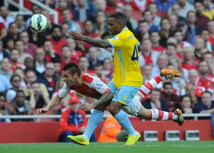 Framed Print : Arsenal vs Crystal Palace: Debuchy vs Puncheon in Intense Premier League Clash Framed Print : Arsenal vs Crystal Palace: Debuchy vs Puncheon in Intense Premier League Clash