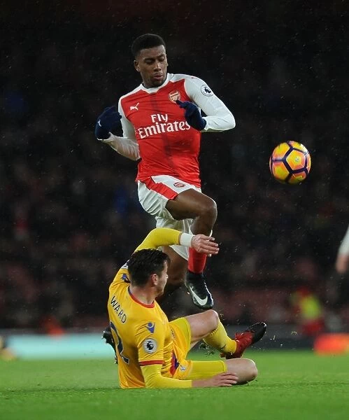 Arsenal vs Crystal Palace: Intense Battle between Alex Iwobi and Joel Ward in the Premier League