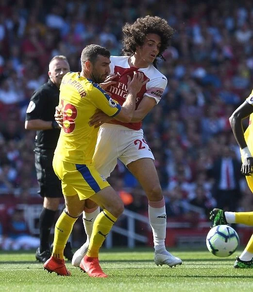 Arsenal vs. Crystal Palace: Intense Battle between Matteo Guendouzi and James McArthur