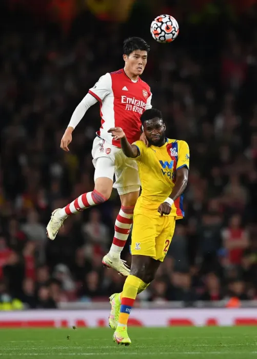 Framed Print : Arsenal vs Crystal Palace: Intense Battle between Tomiyasu and Edouard in the Premier League Framed Print : Arsenal vs Crystal Palace: Intense Battle between Tomiyasu and Edouard in the Premier League