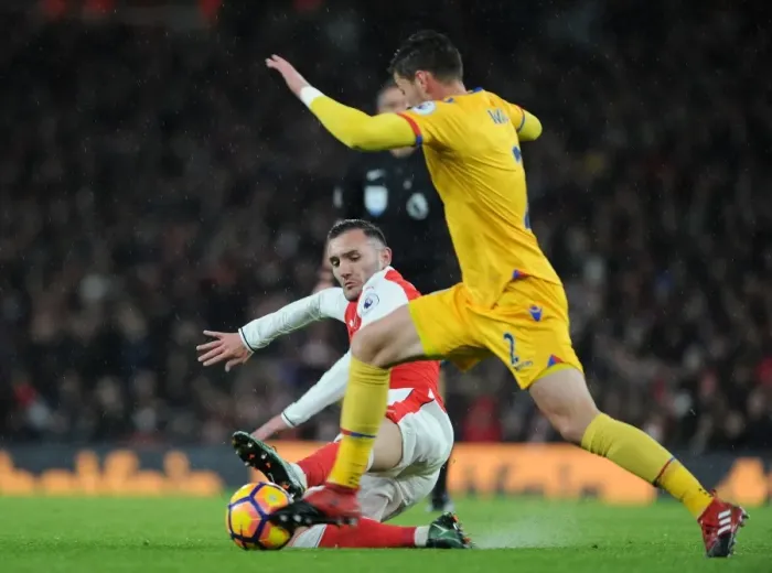Framed Print : Arsenal vs. Crystal Palace: Lucas Perez Tackles Joel Ward in Premier League Clash at Emirates Stadium Framed Print : Arsenal vs. Crystal Palace: Lucas Perez Tackles Joel Ward in Premier League Clash at Emirates Stadium