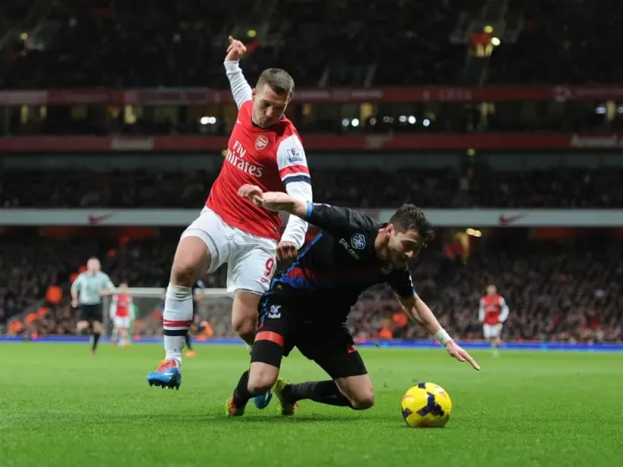 Framed Print : Arsenal vs. Crystal Palace: Lukas Podolski vs. Joel Ward in Intense Premier League Clash Framed Print : Arsenal vs. Crystal Palace: Lukas Podolski vs. Joel Ward in Intense Premier League Clash