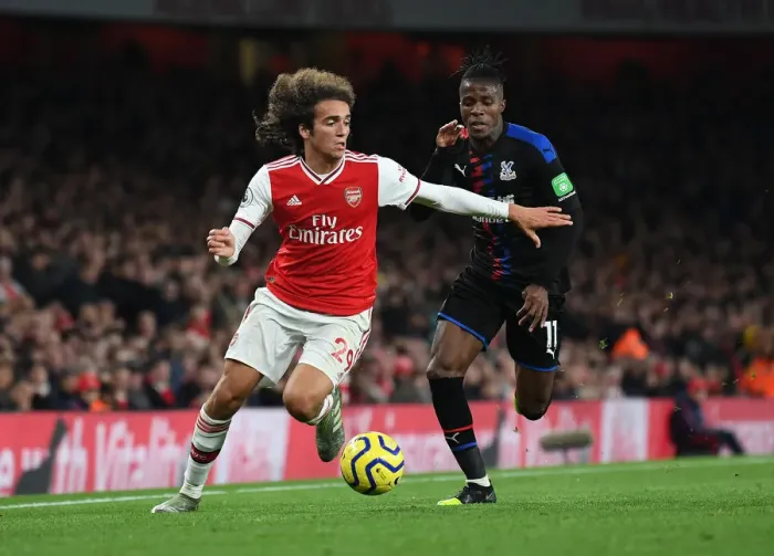 Framed Print : Arsenal vs Crystal Palace: Matteo Guendouzi vs Wilfred Zaha Clash in Premier League Showdown