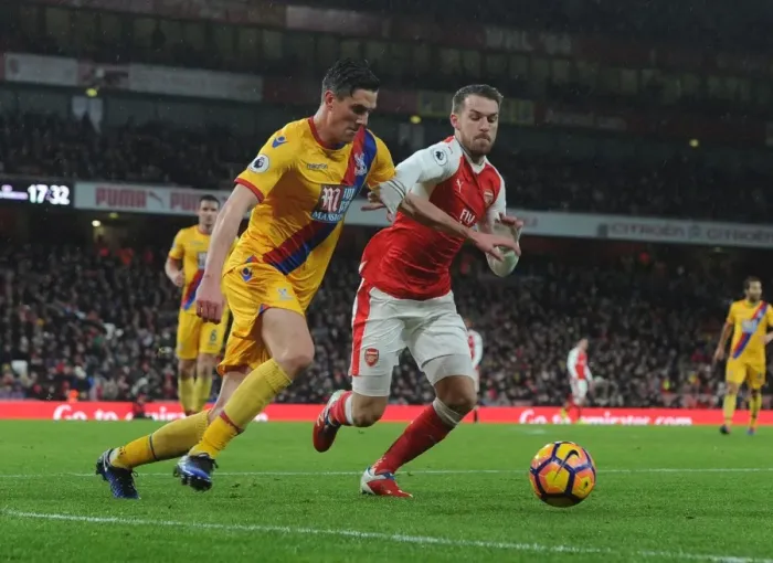 Framed Print : Arsenal vs. Crystal Palace: Ramsey Takes on Ward in Intense Premier League Clash Framed Print : Arsenal vs. Crystal Palace: Ramsey Takes on Ward in Intense Premier League Clash