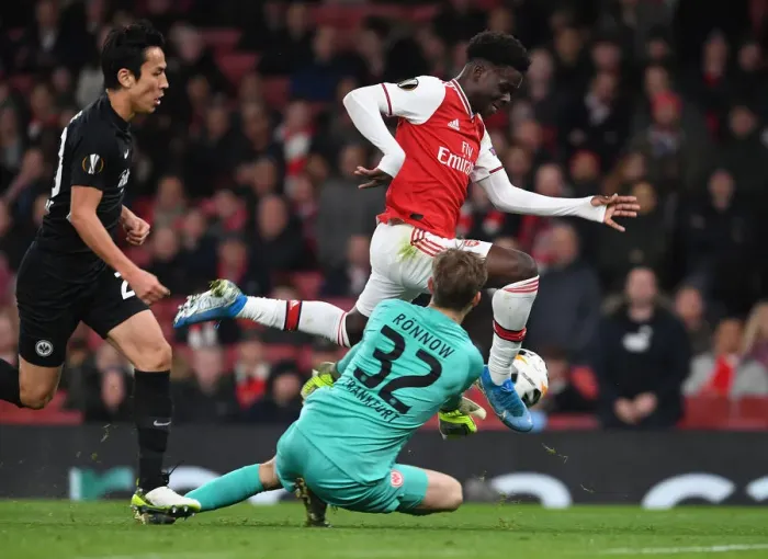 Framed Print : Arsenal vs Eintracht Frankfurt: Bukayo Saka Clash in Europa League Group F Framed Print : Arsenal vs Eintracht Frankfurt: Bukayo Saka Clash in Europa League Group F