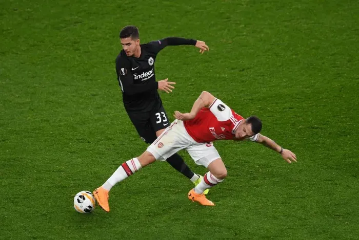 Framed Print : Arsenal vs Eintracht Frankfurt: Granit Xhaka Clashes with Andre Silva in Europa League Showdown