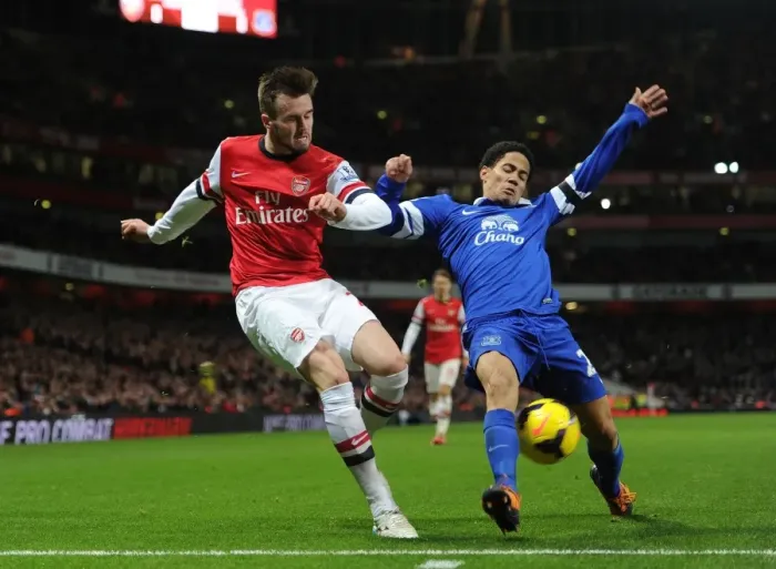 Framed Print : Arsenal vs. Everton: Jenkinson vs. Pienaar in Intense Premier League Clash