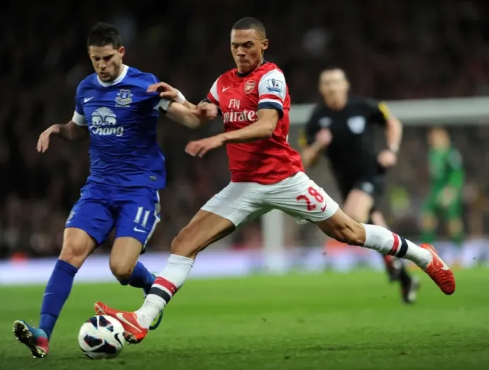 Framed Print : Arsenal vs. Everton: Kieran Gibbs Tackles Kevin Mirallas in Intense Premier League Clash Framed Print : Arsenal vs. Everton: Kieran Gibbs Tackles Kevin Mirallas in Intense Premier League Clash