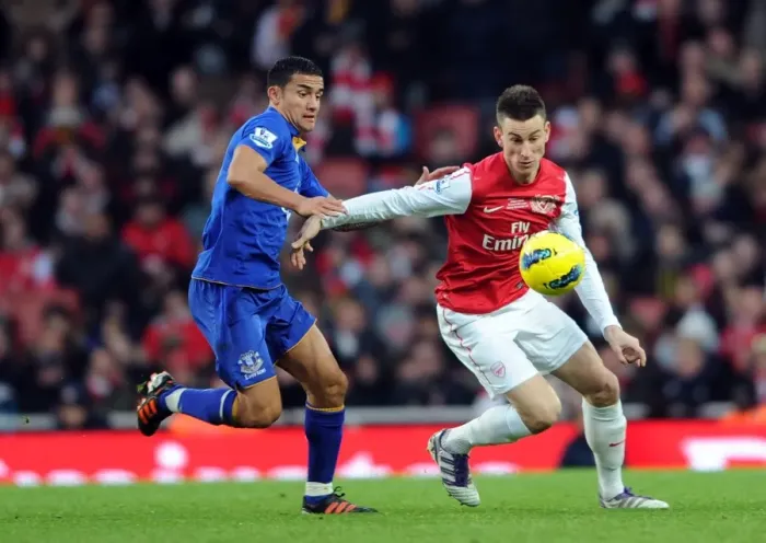 Framed Print : Arsenal vs. Everton: Koscielny vs. Cahill - Intense Battle in the Premier League Framed Print : Arsenal vs. Everton: Koscielny vs. Cahill - Intense Battle in the Premier League