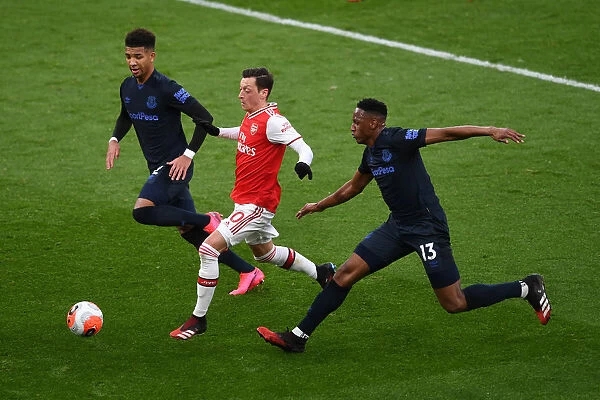 Arsenal vs Everton: Ozil Faces Off Against Holgate and Mina in Intense Premier League Clash