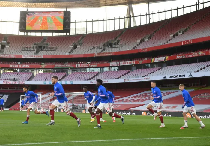 Framed Print : Arsenal vs. Everton: Premier League Showdown - Arsenal Players Warm Up at Emirates Stadium