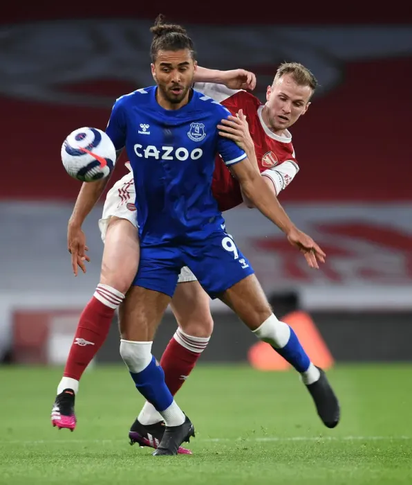 Framed Print : Arsenal vs. Everton: Rob Holding vs. Dominic Calvert-Lewin in Empty Emirates Stadium, Premier League Clash (April 2021)