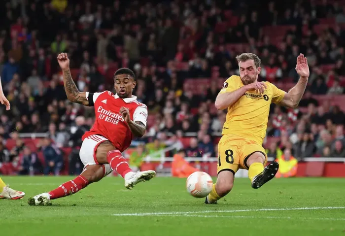 Framed Print : Arsenal vs. FK Bodo / Glimt: Tense Moment as Reiss Nelson Shoots in UEFA Europa League