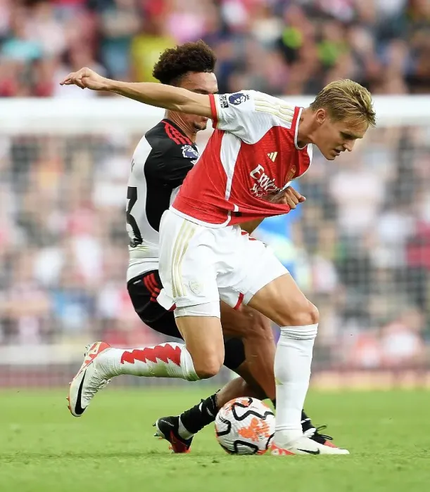 Framed Print : Arsenal vs. Fulham: Battle for Possession in the Premier League (2023-24)