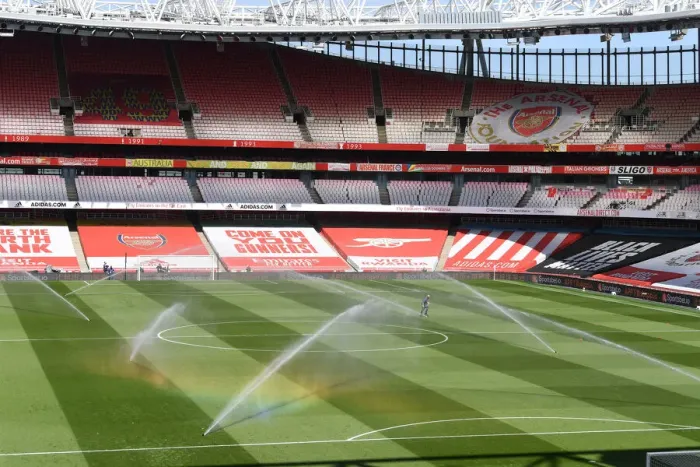 Framed Print : Arsenal vs Fulham: Emirates Stadium, London - Empty Seats and Pirch Watering Amidst Coronavirus Restrictions, April 2021 Framed Print : Arsenal vs Fulham: Emirates Stadium, London - Empty Seats and Pirch Watering Amidst Coronavirus Restrictions, April 2021