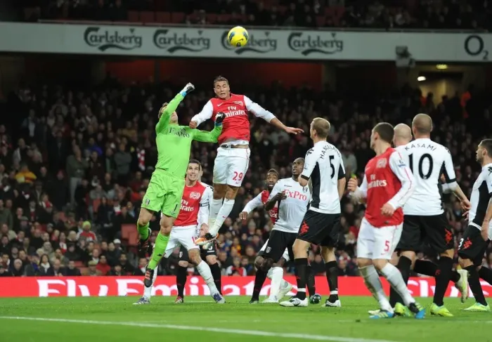 Framed Print : Arsenal vs. Fulham: Johan Djourou vs. Mark Schwarzer Clash at Emirates Stadium (2011-12)