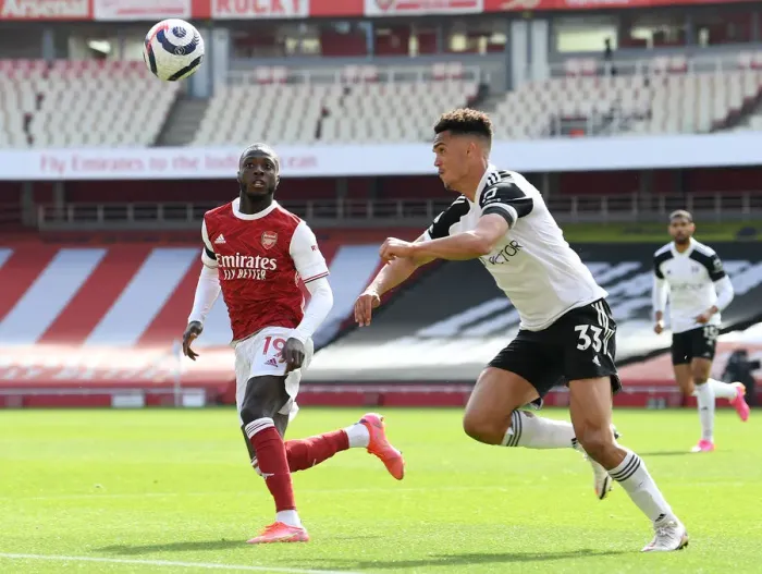 Framed Print : Arsenal vs Fulham: Pepe Faces Pressure in Empty Emirates Stadium, Premier League 2020-21