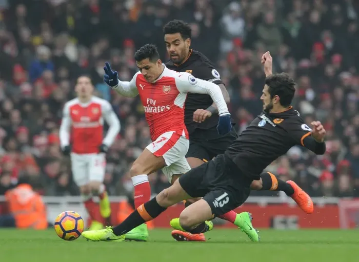 Framed Print : Arsenal vs Hull City: Sanchez Faces Off Against Defenders