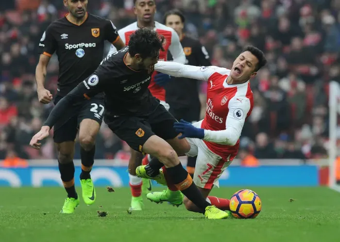 Framed Print : Arsenal vs Hull City: Sanchez Fouls Ranocchia in Intense Premier League Clash Framed Print : Arsenal vs Hull City: Sanchez Fouls Ranocchia in Intense Premier League Clash