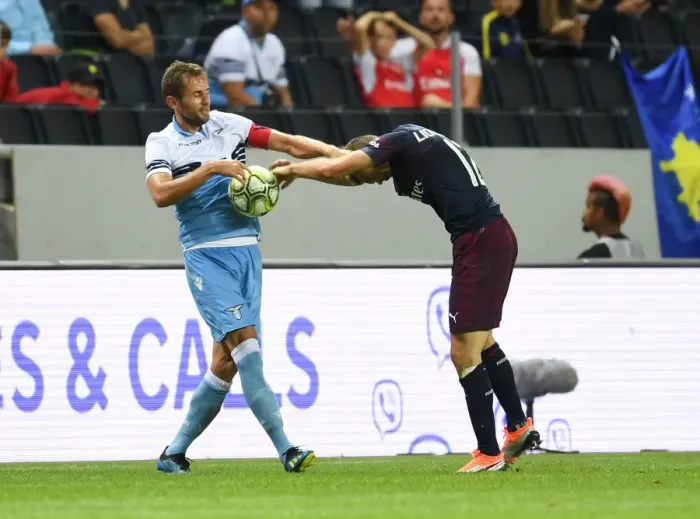 Framed Print : Arsenal vs. Lazio: Clash Between Lichtsteiner and Lulic in Pre-Season Friendly Framed Print : Arsenal vs. Lazio: Clash Between Lichtsteiner and Lulic in Pre-Season Friendly