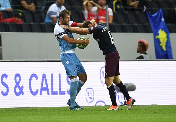 Arsenal vs. Lazio: Stephan Lichtsteiner and Senad Lulic Clash in Pre-Season Friendly