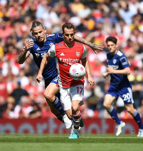 Arsenal vs Leeds United: Cedric Outmaneuvers Phillips in Thrilling Premier League Clash