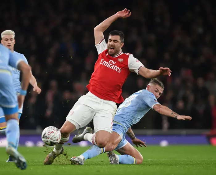 Framed Print : Arsenal vs Leeds United: Sokratis Clashes with Phillips in FA Cup Third Round