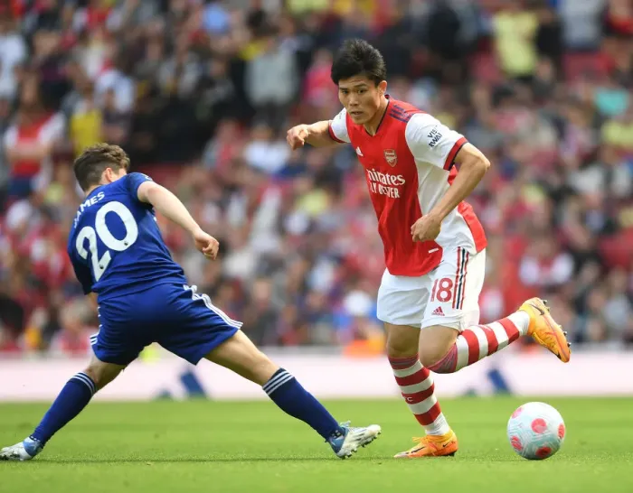 Framed Print : Arsenal vs Leeds United: Tomiyasu vs James Clash in Premier League Showdown