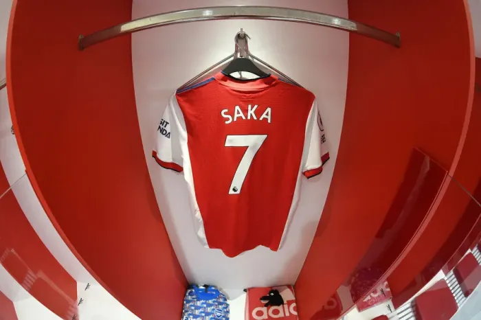 Framed Print : Arsenal vs Liverpool: Bukayo Saka's Hanging Jersey in Arsenal Changing Room (Premier League 2021-22)