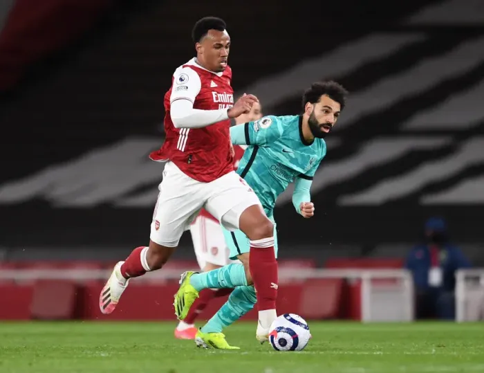 Framed Print : Arsenal vs. Liverpool: Gabriel Magalhaes vs. Mohamed Salah - Premier League Showdown at Emirates Stadium