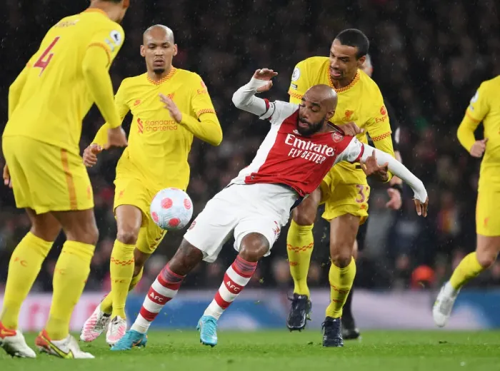 Framed Print : Arsenal vs. Liverpool: Intense Battle between Lacazette and Matip in the Premier League Framed Print : Arsenal vs. Liverpool: Intense Battle between Lacazette and Matip in the Premier League