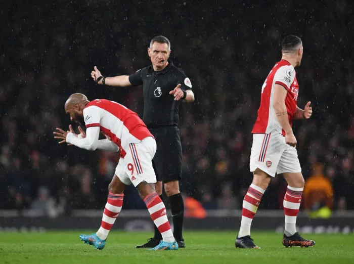 Framed Print : Arsenal vs. Liverpool: Intense Moment Between Lacazette and Xhaka Amidst Premier League Controversy