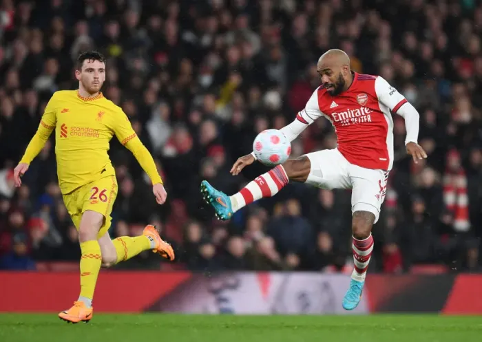 Framed Print : Arsenal vs Liverpool: Lacazette vs Robertson - Premier League Clash at Emirates Stadium