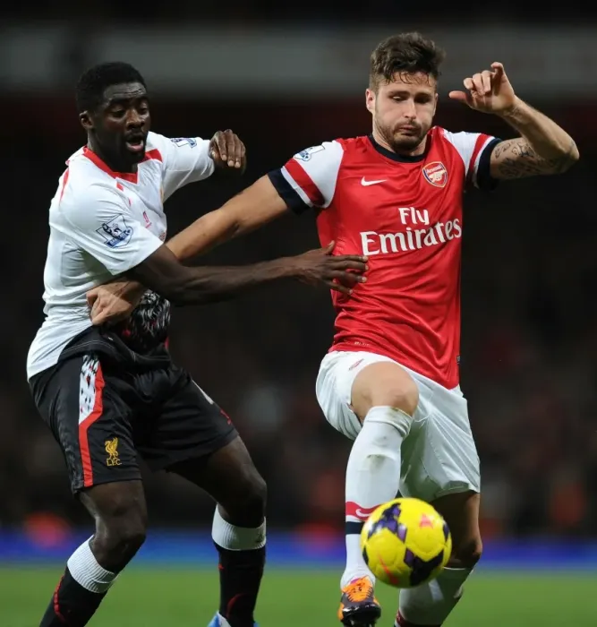 Framed Print : Arsenal vs. Liverpool: Olivier Giroud vs. Kolo Toure - Intense Battle in the 2013-14 Premier League Framed Print : Arsenal vs. Liverpool: Olivier Giroud vs. Kolo Toure - Intense Battle in the 2013-14 Premier League