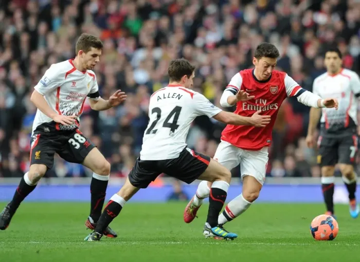 Framed Print : Arsenal vs. Liverpool: Ozil Clashes with Allen and Flanagan in FA Cup Showdown
