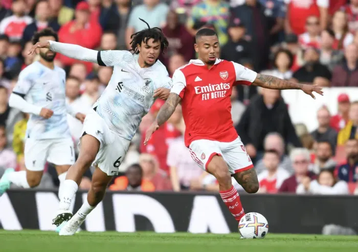 Framed Print : Arsenal vs. Liverpool: A Premier League Clash of Titans
