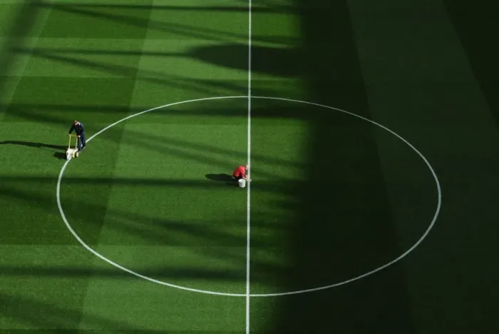 Framed Print : Arsenal vs Liverpool: Behind the Scenes - Pre-Match Pitch Preparation, 2013-14, Emirates Stadium